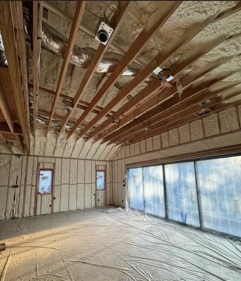 Interior walls and ceiling insulated with spray foam during new construction in Delaware